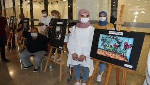 Diyarbakır'da "Eve sığan anılar" sergilendi
