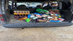 Isparta'da marketten hırsızlık yaptığı öne sürülen iki zanlı tutuklandı