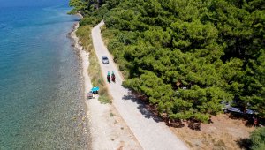 Kuşadası'ndaki milli parkta görevli atlı jandarmadan Kovid-19 uyarısı