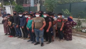 Antalya'da minibüse taşıma sınırının üstünde binen Suriyeli gruba Kovid-19 cezası 