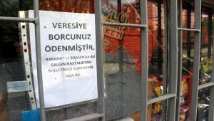 Karabük'te bir hayırsever veresiye defterlerini satın alarak vatandaşların borçlarını sildirdi
