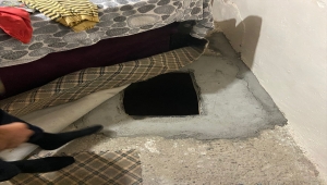 Hamile kadını tabancayla vuran zanlı, evinde kanepenin altına kazdığı çukurda yakalandı