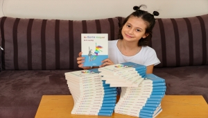 Kemik kanserini yenen 10 yaşındaki Ecrin, kitabını "mutlu son"la tamamladı