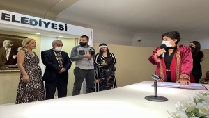 Toplu nikah töreninde babasıyla aynı gün "evet" dedi