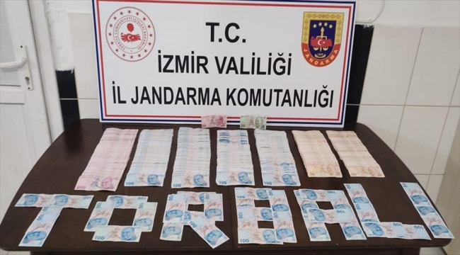 İzmir'de yazılım açığını kullanarak ATM'den para çeken şüpheli yakalandı