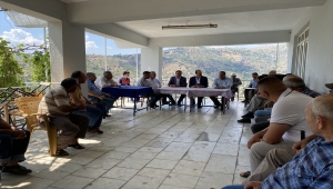 MHP'li Osmanağaoğlu, İzmir'de doludan zarar gören mahalleyi ziyaret etti