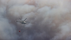 Muğla Valisi Tavlı yangın bölgesinde çalışan yer ekiplerini ziyaret etti
